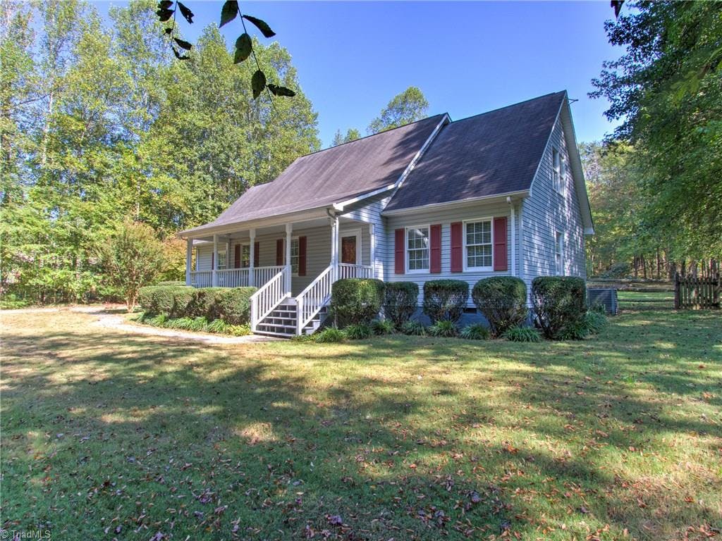Exterior photo of 125 Bethany Woods Drive, Summerfield NC 27358. MLS: 952860