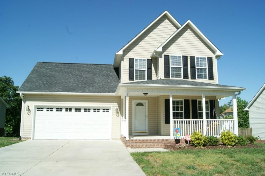 Adorable 3BR/2.1Bath home with paved drive and 2 car garage is like new and move-in ready!