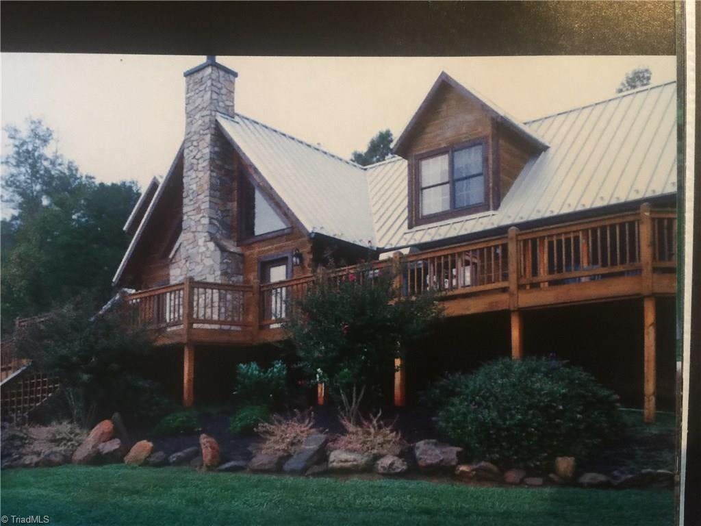 Beautiful custom stone and log home built in 2010, insulated to the max, Smart home one knob does it all, Bose Surround sound inside and out ,Metal roofing, 1000 ft deck, and insightful landscaping around home