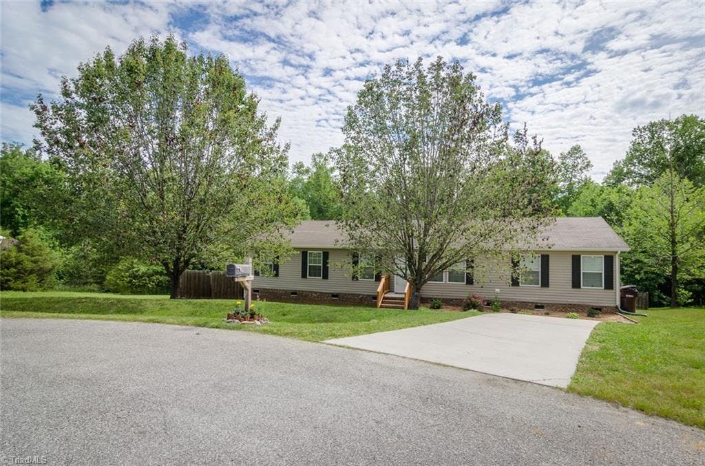 Exterior photo of 5609 Bridletree Court, McLeansville NC 27301. MLS: 795480