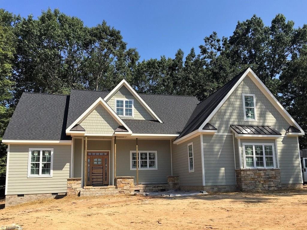 Welcome to one level living in beautiful Magnolia Acres! Accented with natural stone, metal accents, and Hardie Plank siding this well appointed home is almost ready to call home.