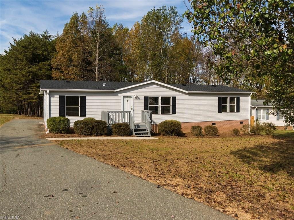 Exterior photo of 4507 Saddlebranch Drive, Gibsonville NC 27249. MLS: 813382
