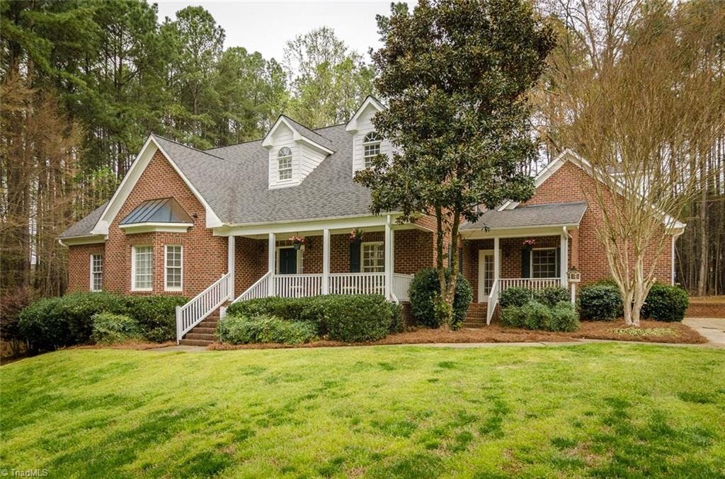 Wonderful home on .94 acre.  The home sits back on the lot for privacy.  There are two front porches with two entrances.
