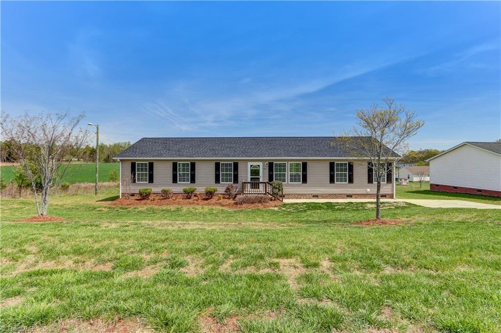 Exterior photo of 5481 Hitching Post Drive, Gibsonville NC 27249. MLS: 830602