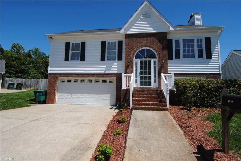 Exterior photo of 1492 Lewisburg Pointe Drive, Clemmons NC 27012. MLS: 833013