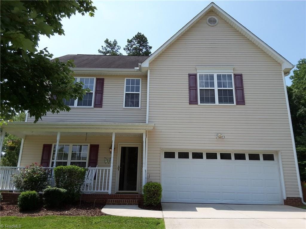 Beautiful Home with Rocking Chair Front Porch on Glen Cove Way in The Landing at Waterview!