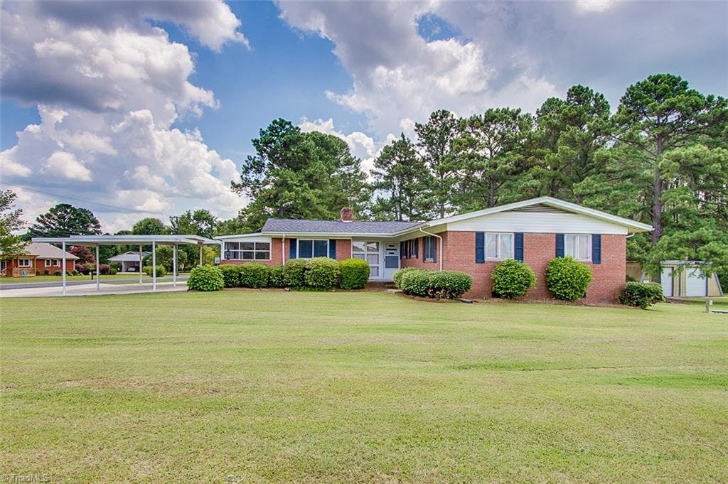 Well maintained brick ranch home on corner lot, convenient to Piney Point Golf Club & Pool.