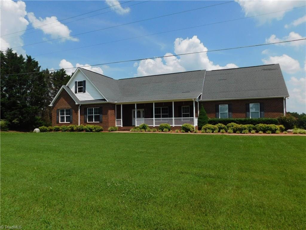 Exterior photo of 231 Anderson Road, Siloam NC 27047. MLS: 893277