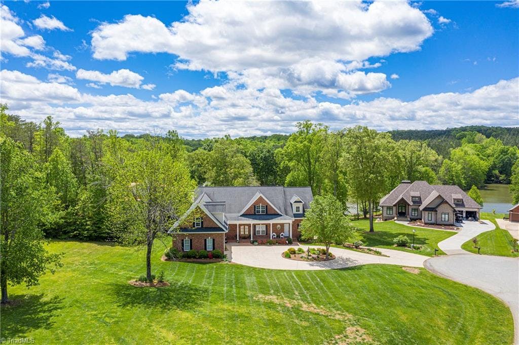 Fabulous Lakefront Home On Belews Creek! This is a rare find in Forsyth County. Featuring over 7,500 S/F of lakefront luxury. Probably the most energy efficient home in the county, likely the most energy efficient home in North Carolina!