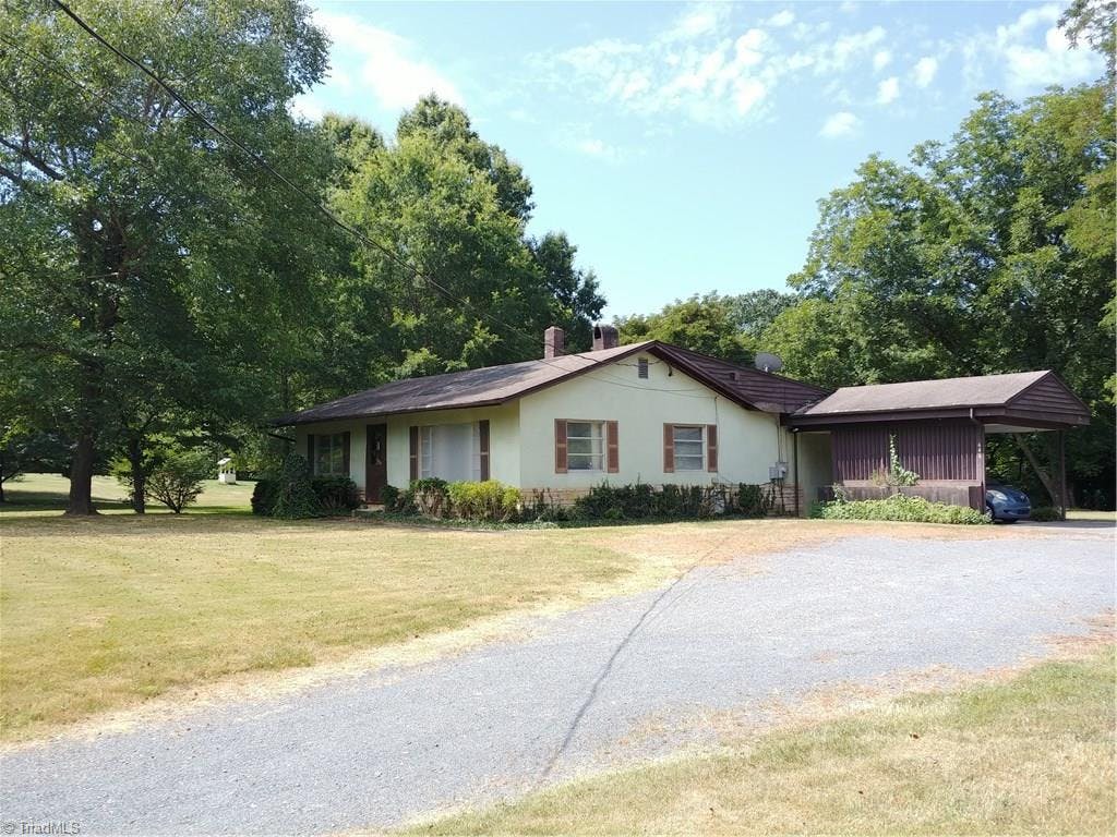 Exterior photo of 646 NC Highway 65, Wentworth NC 27320. MLS: 987569