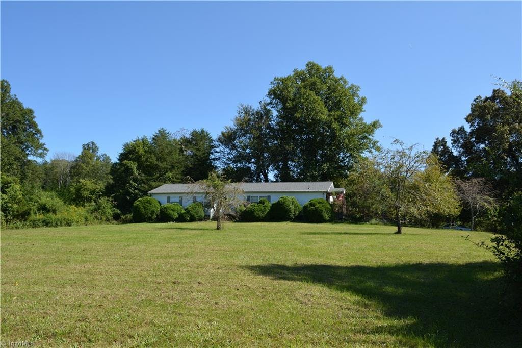 Exterior photo of 562 Traphill Mill Road, Traphill NC 28685. MLS: 995078