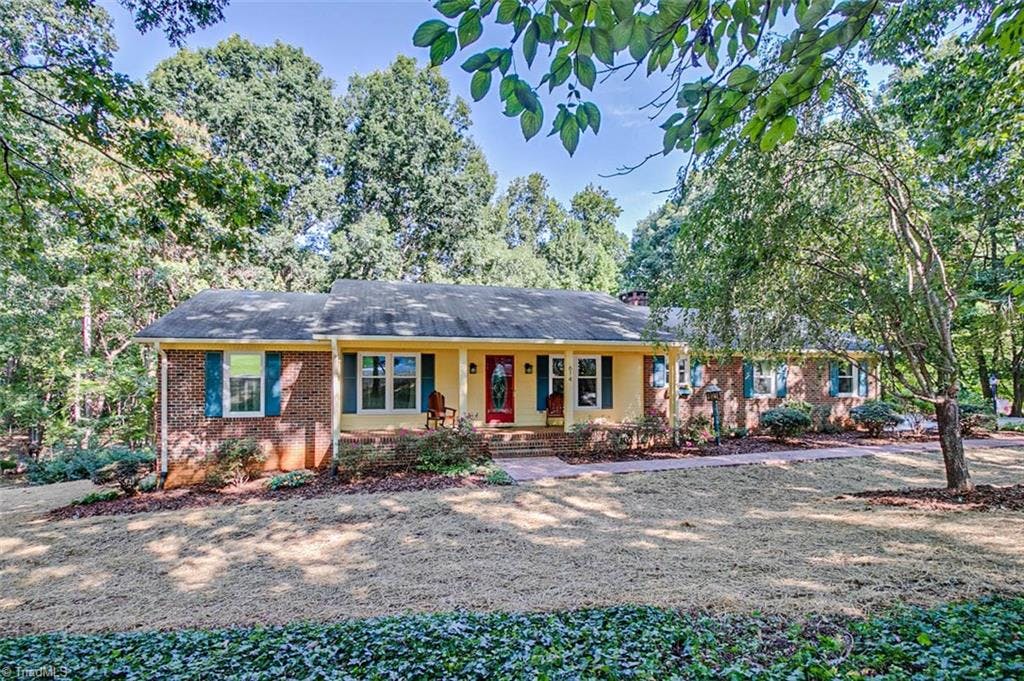 Beautiful updated brick ranch with covered front porch!