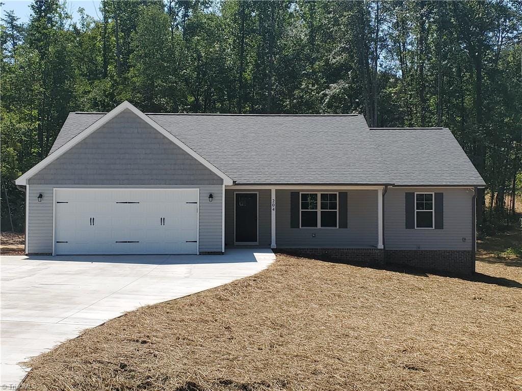 Exterior photo of 204 Rockwood Drive, Stokesdale NC 27357. MLS: 1021929