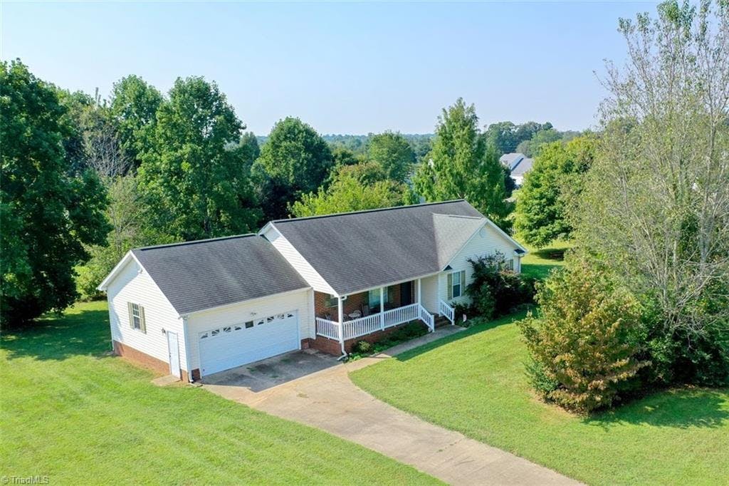 Exterior photo of 5502 Bentwood Drive, McLeansville NC 27301. MLS: 1042519