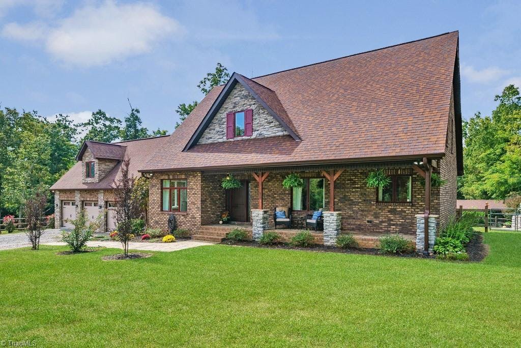 Rustic tumbled brick home on 10.08 acres