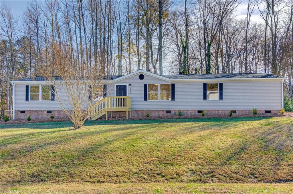 Exterior photo of 5496 Quarter Horse Trail, Gibsonville NC 27249. MLS: 1051223