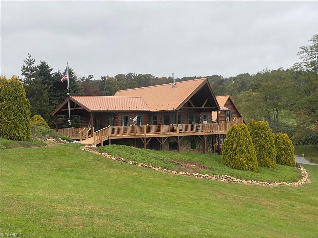 Gorgeous true log home with fabulous views of the Blue Ridge Parkweay
