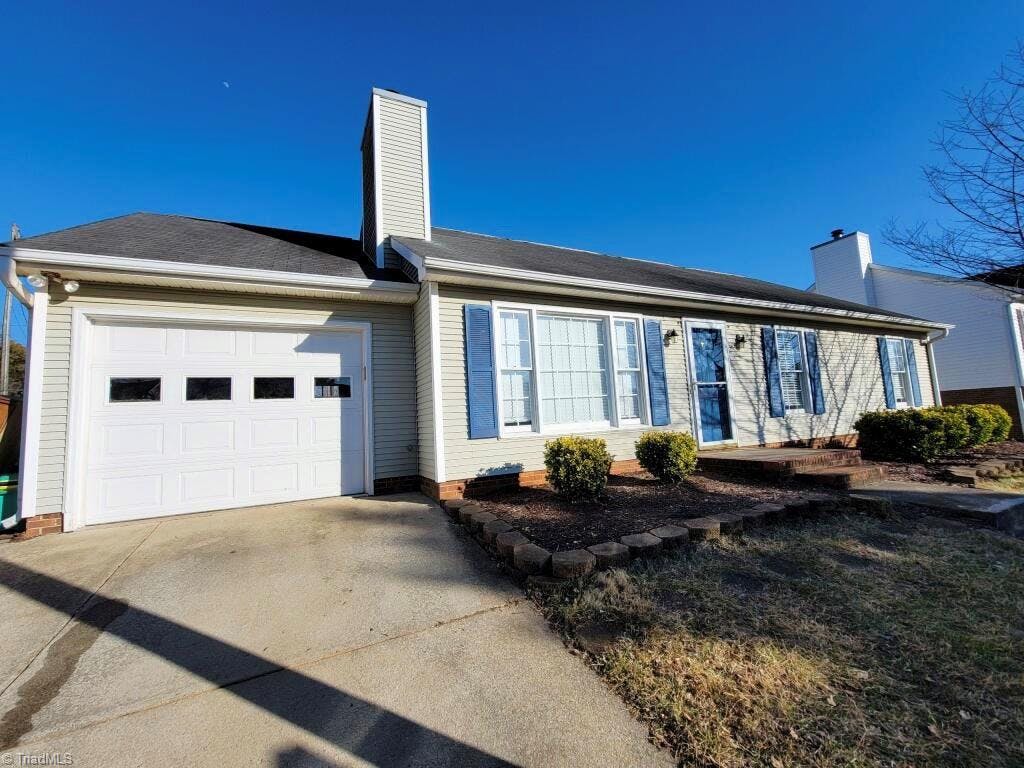 Exterior photo of 1504 Lewisburg Pointe Drive, Clemmons NC 27012. MLS: 1058338