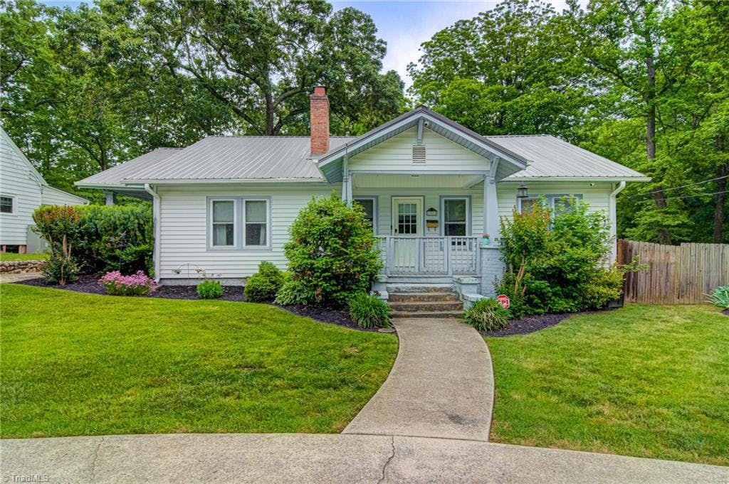 Welcome home to charming 709 S Park Street!