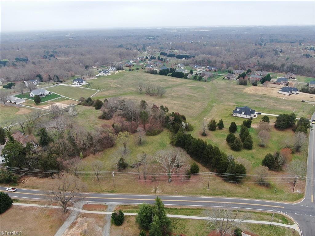 3  parcels combined to male one 5 acre piece of land in the heart of Oak Ridge, NC