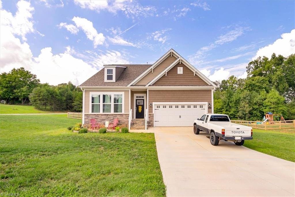 Exterior photo of 111 Ravensbourne Trace, Stokesdale NC 27357. MLS: 1083348