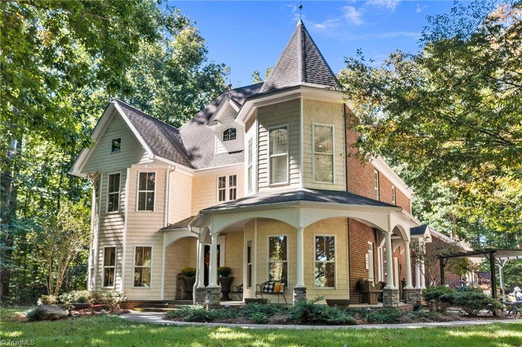 Stunning contractor's custom home built from an 1800's historic reproduction Victorian house plan.