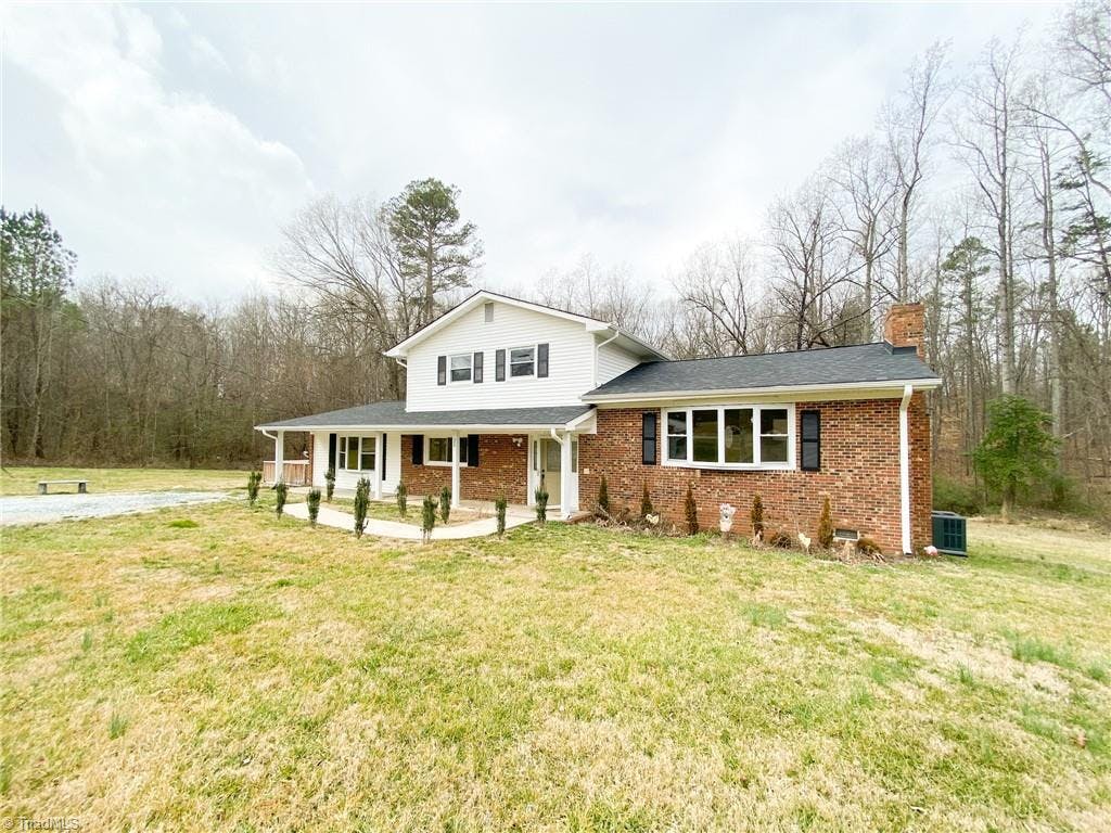 Exterior photo of 302 Sharonwood Drive, Gibsonville NC 27249. MLS: 1095188