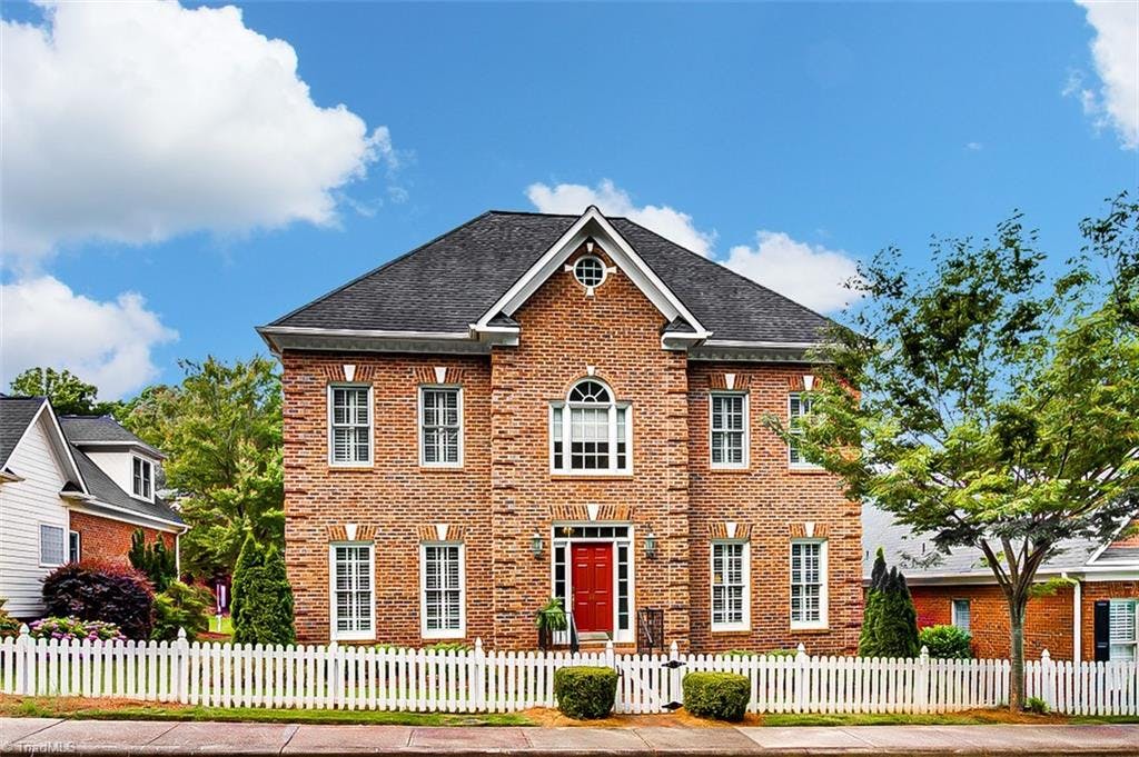 Classic, tradition all brick home situated on the park at Checkerberry Square.