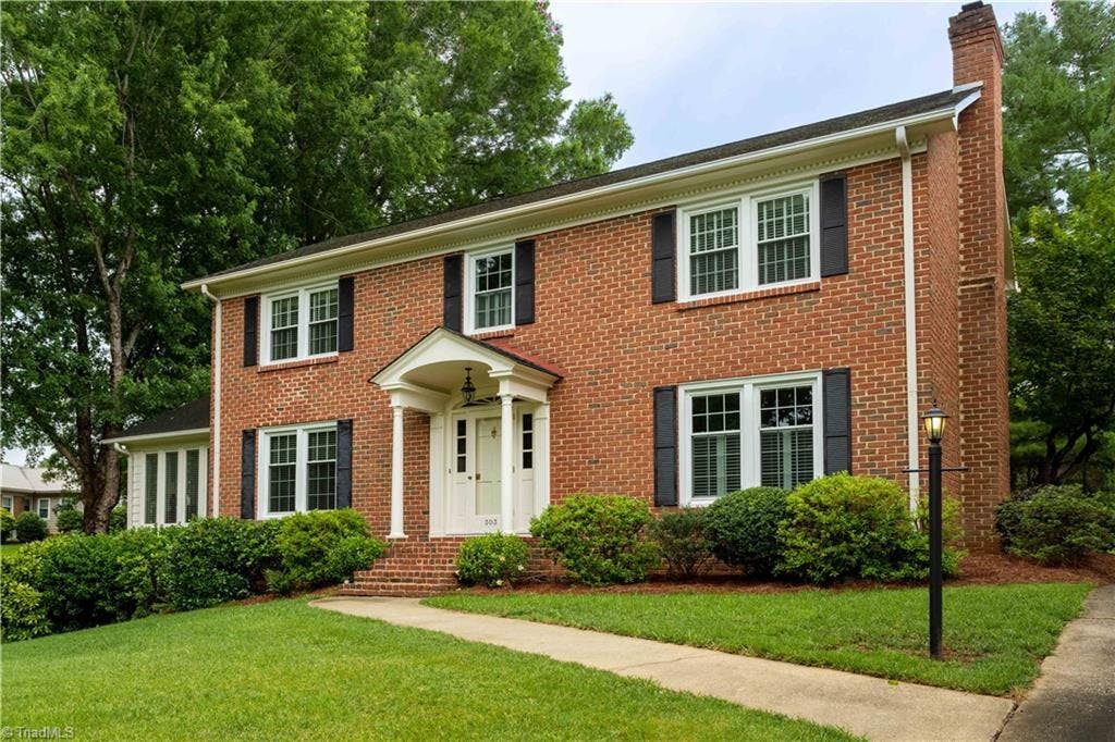 Pristine inside and out, this lovely brick home is loaded with curb appeal!