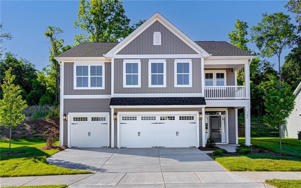 Welcome to 162 Moravian Court in the Brayden Community! This stunning home features a three-car garage!