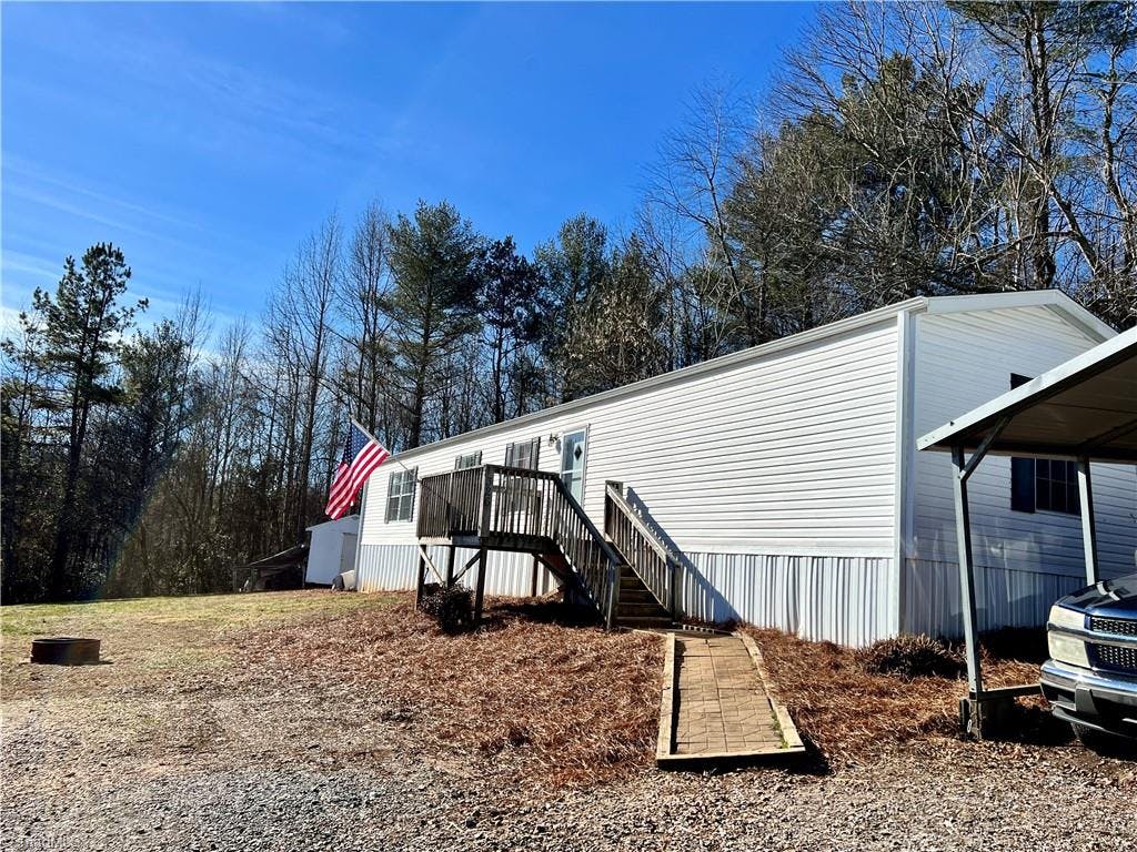 Exterior photo of 326 Huffman Fork Road, Purlear NC 28665. MLS: 1138569