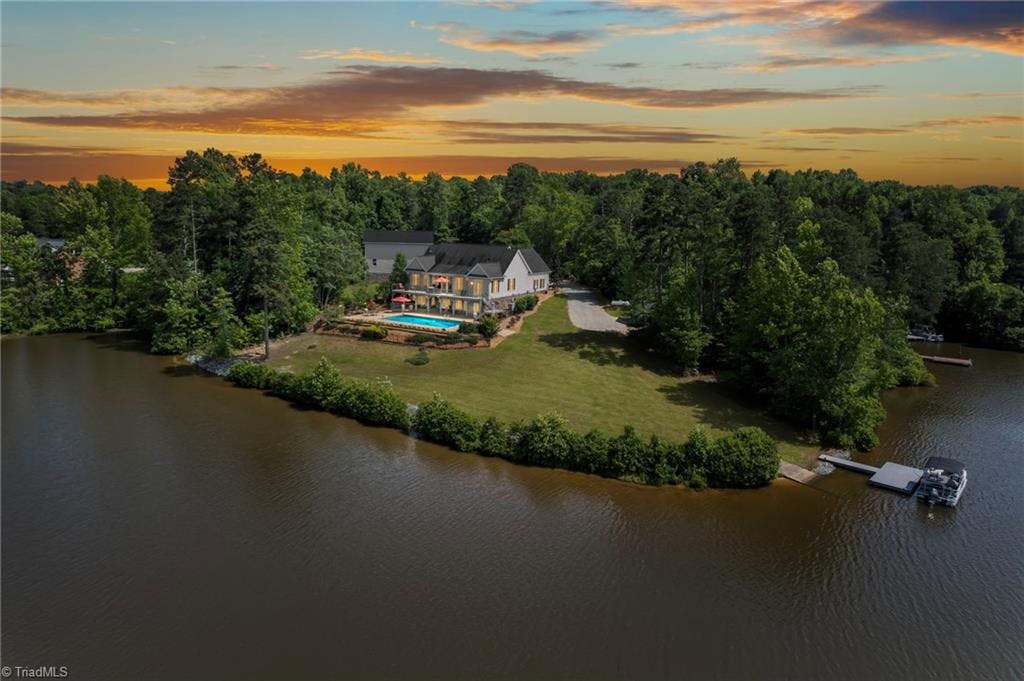Lake Roxboro in Caswell County view of this private lake 3 bedroom and 3 baths basement, inground pool and RV/3car detached garage, lots of extras