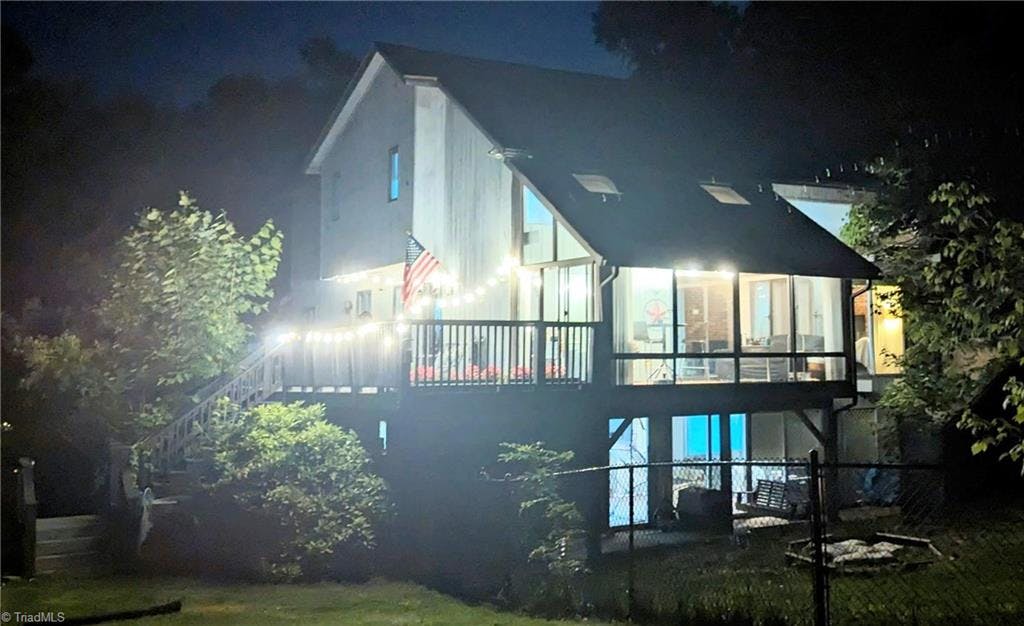 Porch lights line the 40 ft deck tons of windows and all the privacy!