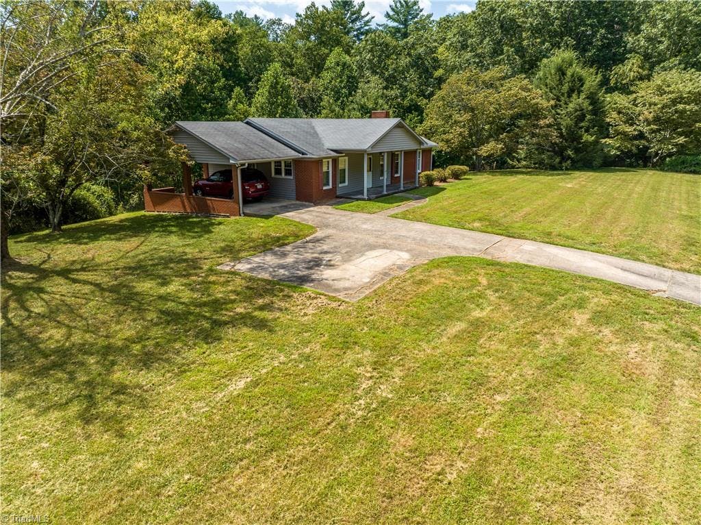 Exterior photo of 883 Zephyr Mountain Park Road, State Road NC 28676. MLS: 1143797