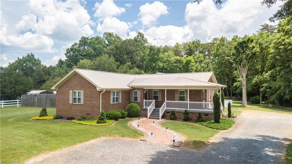 Exterior photo of 4708 McConnell Road, McLeansville NC 27301. MLS: 1146930