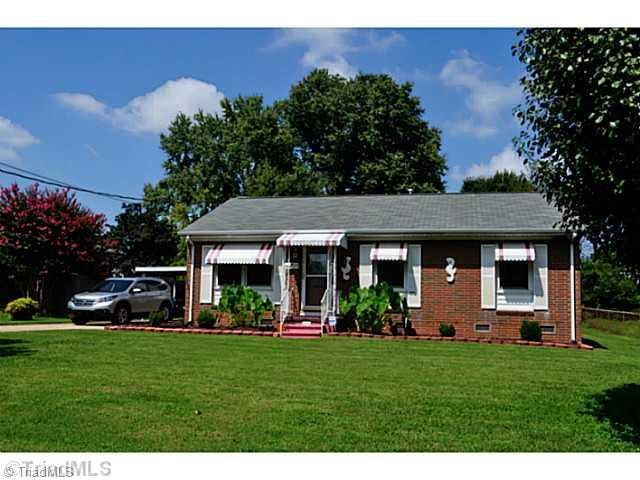 Exterior Front. Attractive well maintained brick home enjoys many updates.