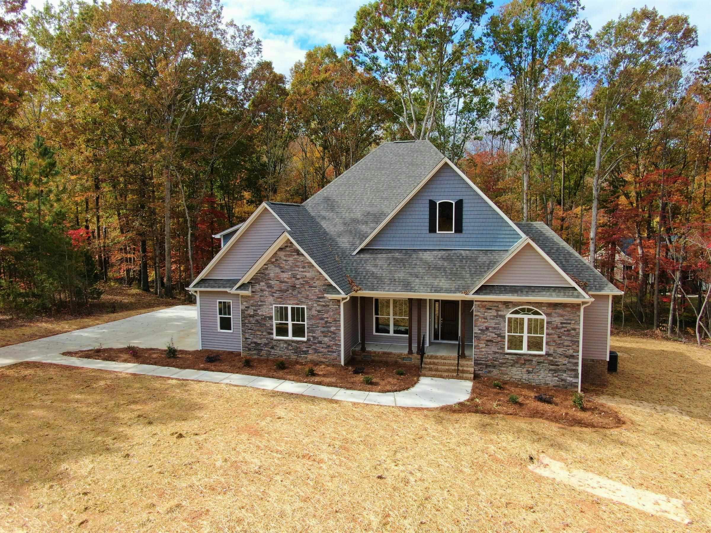 STUNNING new construction on 1.23 acres!