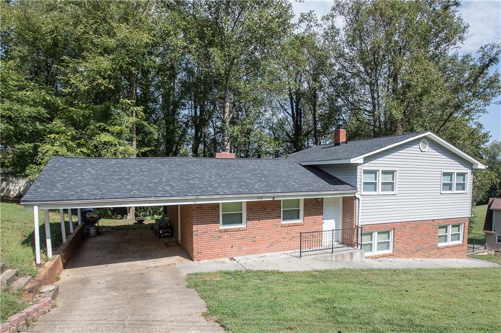 Front view of this lovely home! New Roof in 2017, New Heat Pump in 2019, in desirable Forest Hills development in the heart of Wilkesboro! Super Location!!