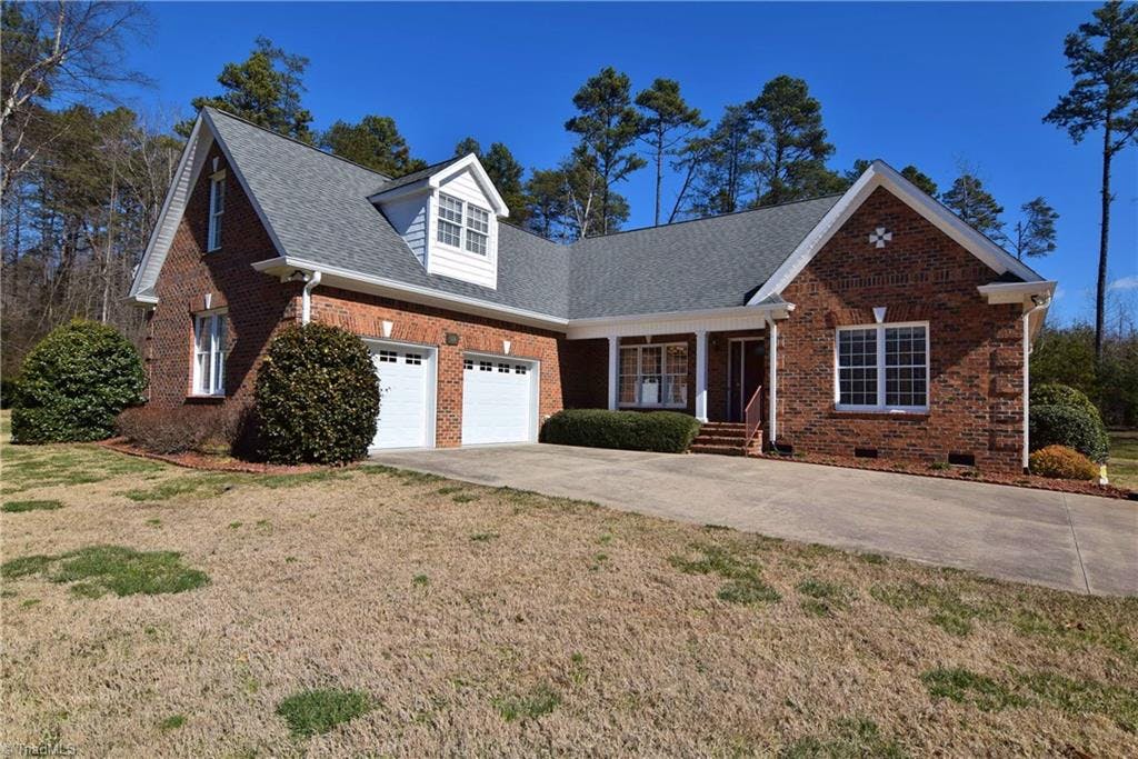 310 Springdale Rd, Walnut Cove, NC 27052 in the Oakwood Park neighborhood.  This is a great home with a large level yard with a split bedroom plan.