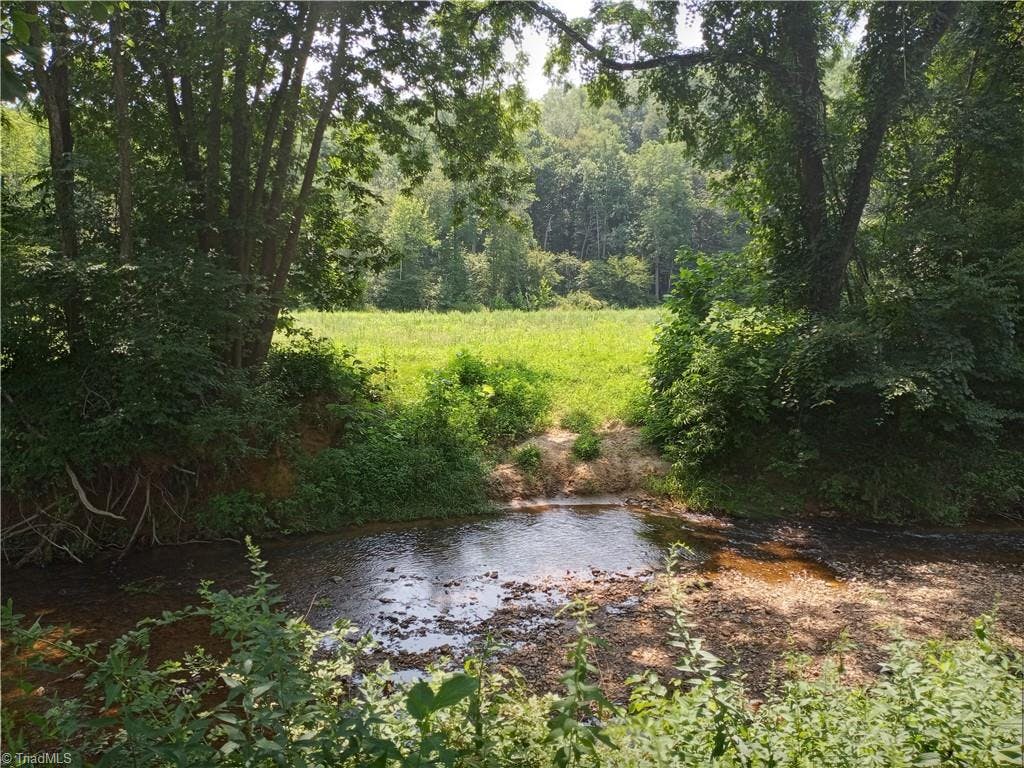 Field across creek is part of the land