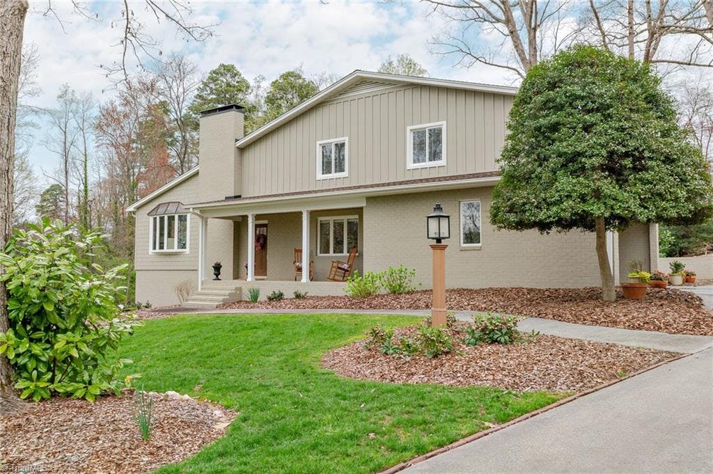 Welcome home! Meticulously maintained exterior features fiber cement and brick siding.