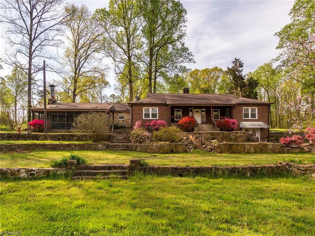 Spacious 3BR/2.5BA home with office, large den and on over 9 acres!