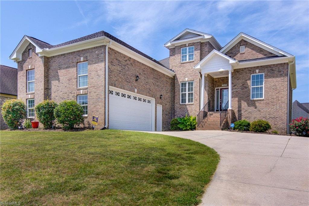 Welcome to this beautiful all brick home with side entry garage on a .46 acre lot.  Two Complete Living Spaces!