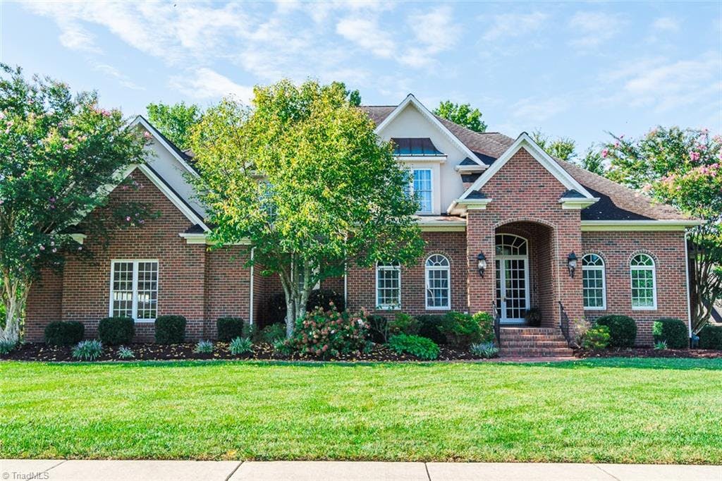 ABSOLUTELY STUNNING 4 sided brick home boasting 4019 sq ft plus basement