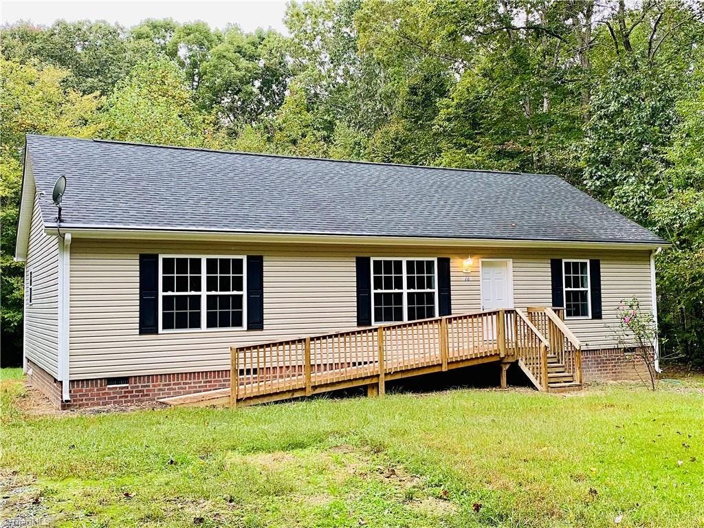 Exterior photo of 1783 Soapstone Mountain Road, Staley NC 27355. MLS: 1045302
