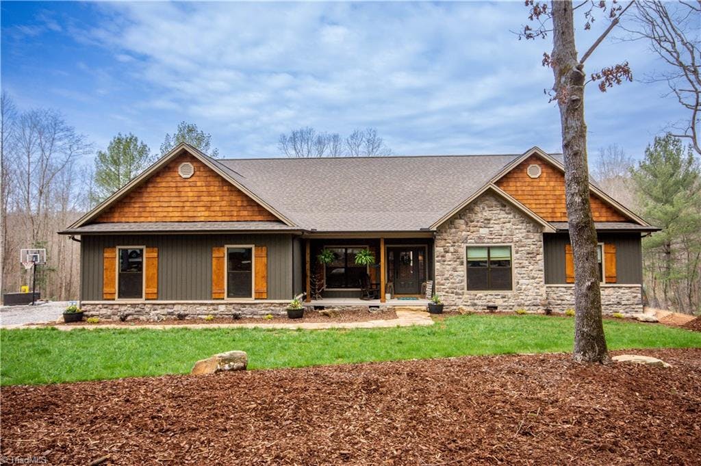 This Custom Craftsman's style home built in 2020 offers maintenance free siding, real cedar shakes in gables, gorgeous private setting among 44 acres with a beautiful creek and surrounded by tons of wildlife!  Excellent deer hunting land!
