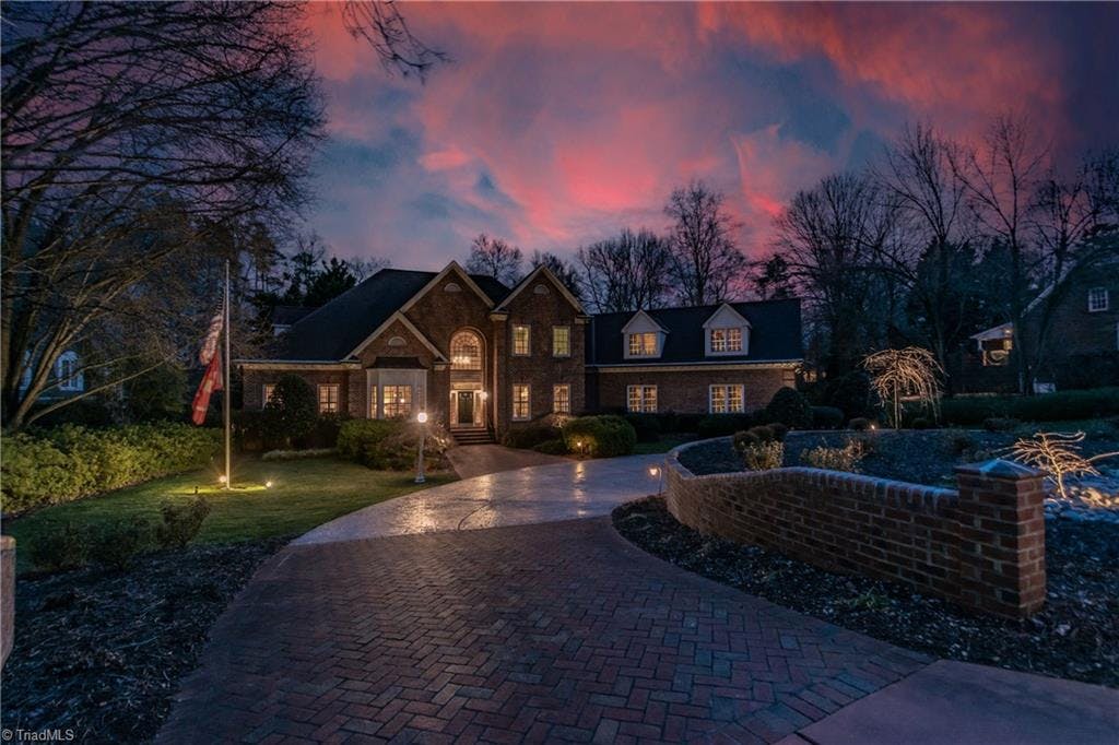 Welcome home to 5505 Mecklenburg Road. Located in the prestigous Sedgefield Country Club community, this custom built Jim Codgill home overlooks the 6th tee and fairway of the Donald Ross course.