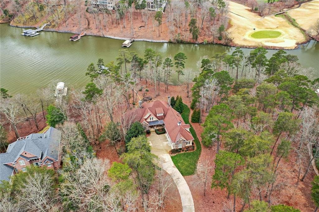 Aerial View of Home and Lake
