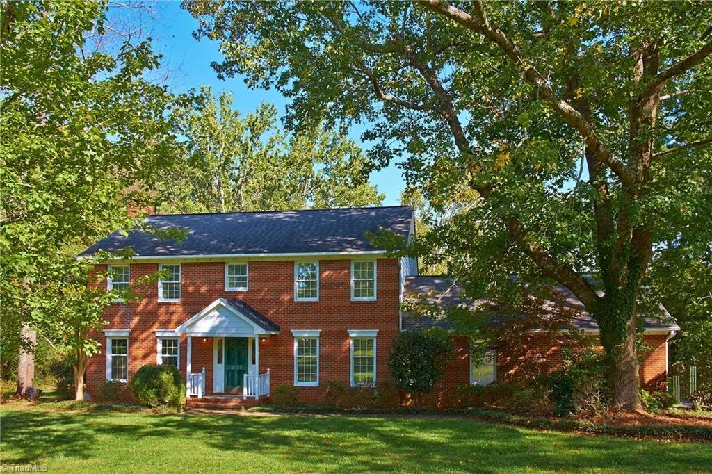 Stately Brick home with beautiful landscaping! Almost 30 trees including oaks, maples, a weeping willow, and a persimmon tree. Gutter guards and dental moldings. Roof replaced in 2008.