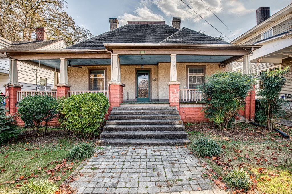 Welcome to this charming bungalow on Library Park